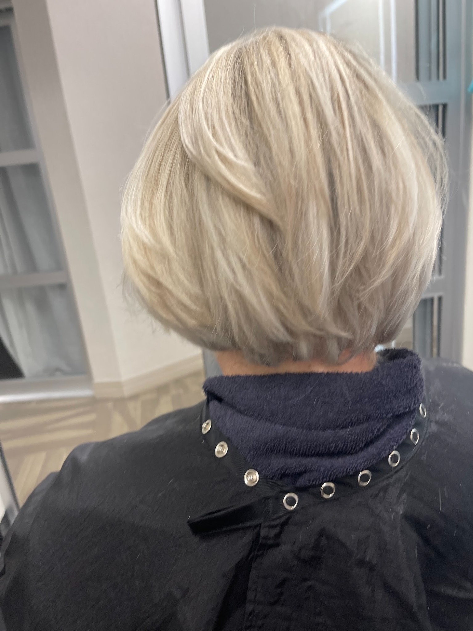 Short silver layered bob haircut